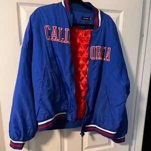 Blue bomber jacket. Only worn once.
